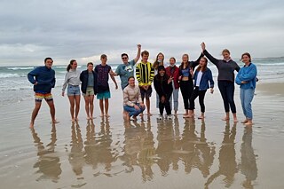 Gruppenfoto am Strand